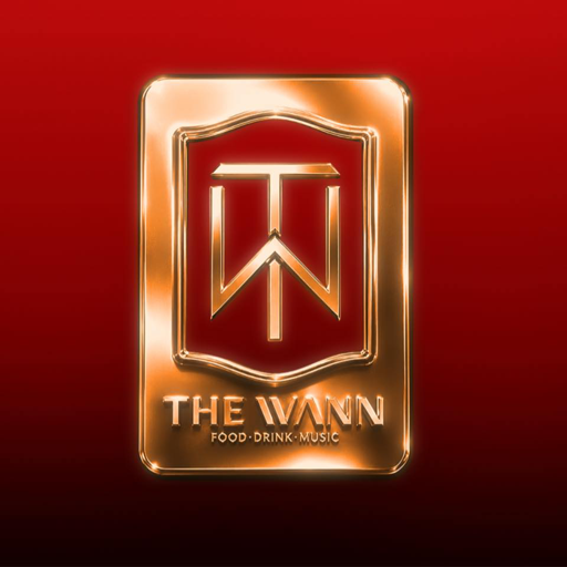 The Wann — logo plaque vàng gold